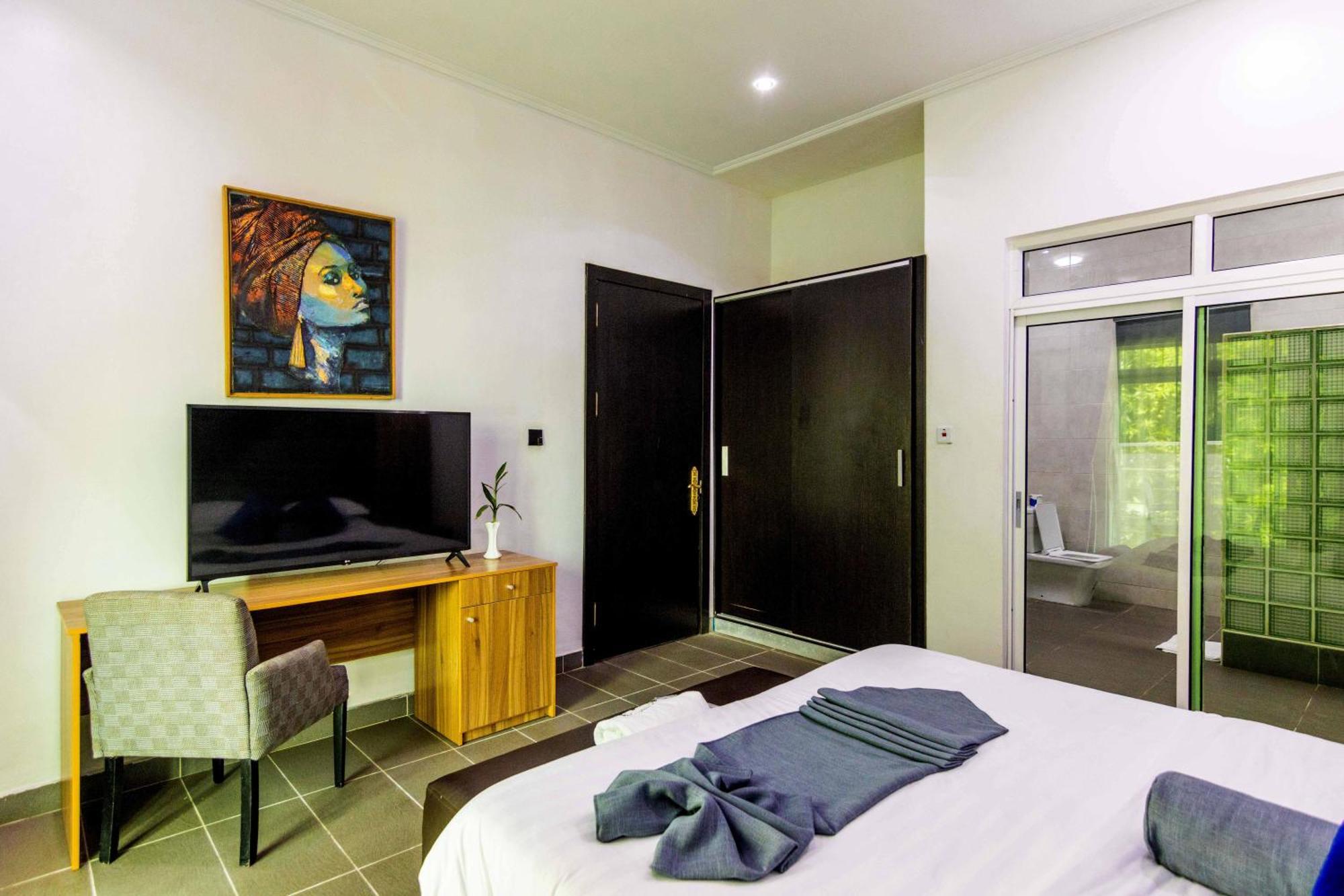 Nelson Mandela Gardens Hotel Okpanam Екстериор снимка