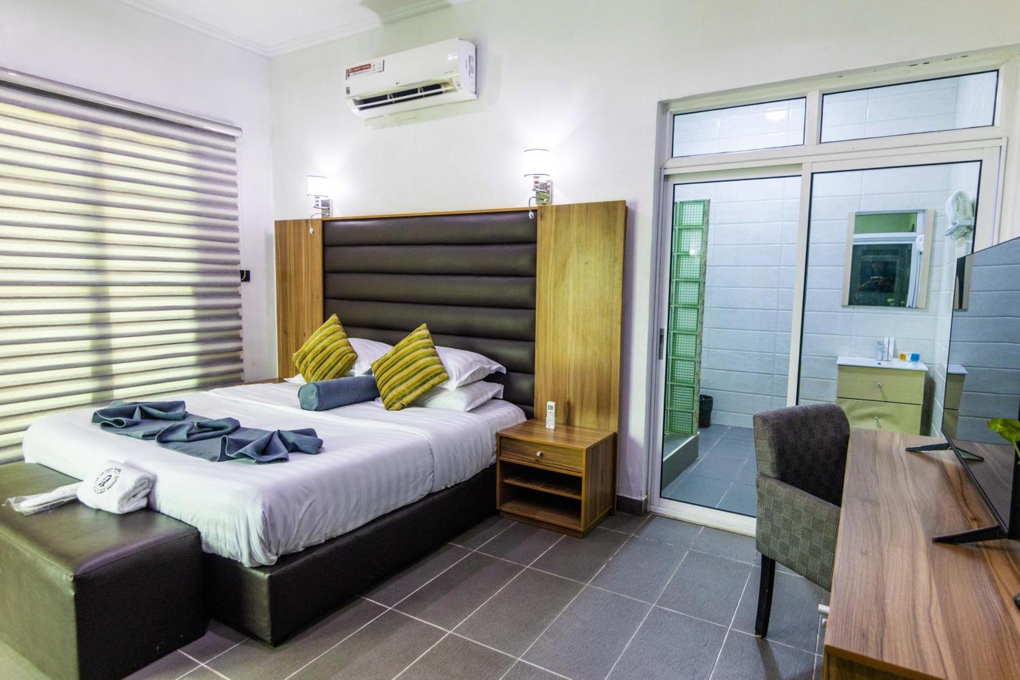 Nelson Mandela Gardens Hotel Okpanam Екстериор снимка